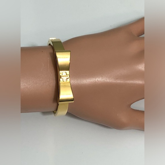 Kate Spade New York Goldtone Bow Bangle Bracelet . - Picture 6 of 9